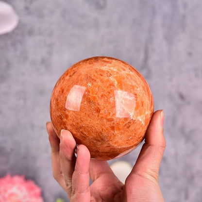 JIC Gem Natural Sunstone Sphere Ball with Wooden Stand for Fengshui Rare Healing Crystal Decoation Meditation Energy Reiki (90-100mm)