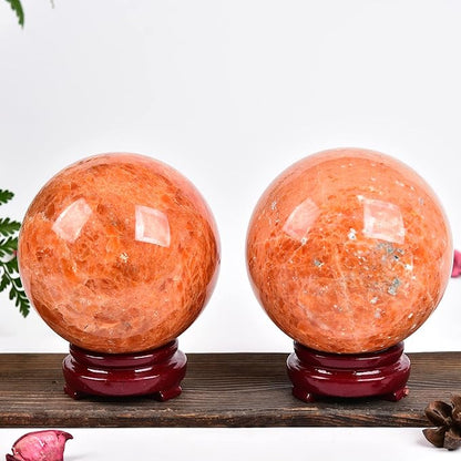 JIC Gem Natural Sunstone Sphere Ball with Wooden Stand for Fengshui Rare Healing Crystal Decoation Meditation Energy Reiki (90-100mm)