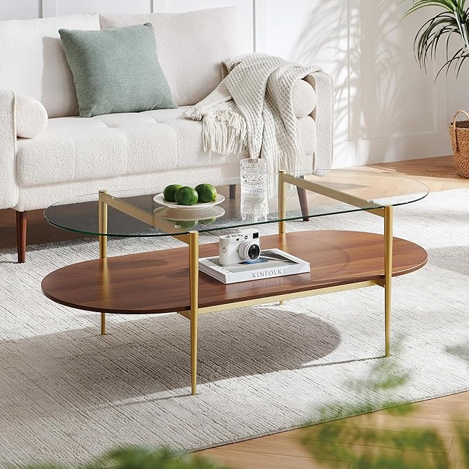 X-Large Oval Glass Coffee Table, Mid-Century Modern Design, L47 x W24 x H17 inch, for Living Room, Clear Glass Top and Walnut Finish Wood Shelf, Conical Legs with Gold Finish Frame